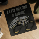 Lets Watch a Movie by Wild Apple Portfolio. Shown as a detailed flat fine art print, highlighting archival giclee quality. Available as an archival giclee rolled canvas, fine art paper, or poster print. SKU 21553a.