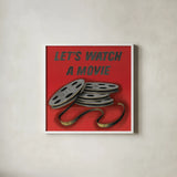 Lets Watch a Movie Red by Wild Apple Portfolio. Shown in a crisp white glass frame for a clean and minimalist style. Available as an archival giclee rolled canvas, fine art paper, or poster print. SKU 52830a.