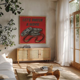 Lets Watch a Movie Red by Wild Apple Portfolio. Shown in a natural wood frame in a cozy modern living room. Available as an archival giclee rolled canvas, fine art paper, or poster print. SKU 52830a.