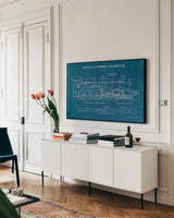 Locomotive Blueprint I by Wild Apple Portfolio. shown as a framed stretched canvas in a living room above a console. Available as a archival giclee rolled canvas, fine art paper, or poster print. SKU 53885i.