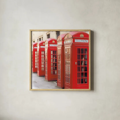 London Phoneboxes by Wild Apple Portfolio. Shown in a natural wood glass frame for a timeless modern aesthetic. Available as an archival giclee rolled canvas, fine art paper, or poster print. SKU 73353a.