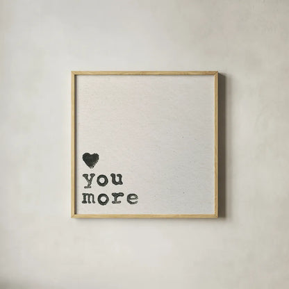 Love You More by Wild Apple Portfolio. Shown in a natural wood glass frame for a timeless modern aesthetic. Available as an archival giclee rolled canvas, fine art paper, or poster print. SKU 71692a.