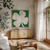 Luck of the Irish I by Wild Apple Portfolio. Shown in a natural wood frame in a cozy modern living room. Available as an archival giclee rolled canvas, fine art paper, or poster print. SKU 49953a.