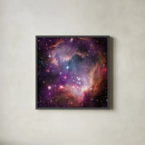 Magellanic Cloud Galaxy by Wild Apple Portfolio. Shown in a sleek black glass frame for a contemporary gallery look. Available as an archival giclee rolled canvas, fine art paper, or poster print. SKU 89316a.