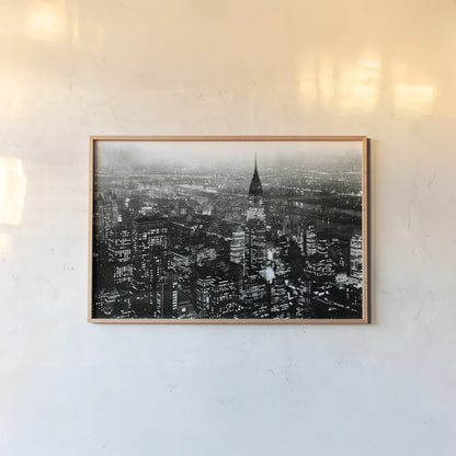 Manhattan at Night Rich Black by Wild Apple Portfolio. shown as a paper print in a natural frame. Available as a archival giclee rolled canvas, fine art paper, or poster print. SKU 64605i.