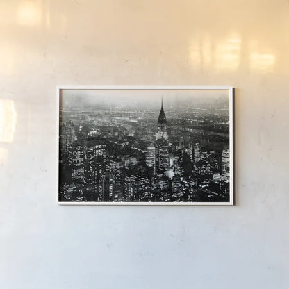 Manhattan at Night Rich Black by Wild Apple Portfolio. shown as a paper print in a white frame. Available as a archival giclee rolled canvas, fine art paper, or poster print. SKU 64605i.