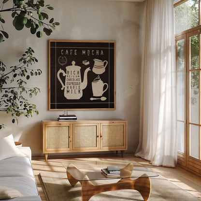 Mocha on Linen Black by Wild Apple Portfolio. Shown in a natural wood frame in a cozy modern living room. Available as an archival giclee rolled canvas, fine art paper, or poster print. SKU 39914a.