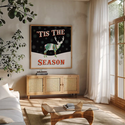 Mod Holiday on Black III by Wild Apple Portfolio. Shown in a natural wood frame in a cozy modern living room. Available as an archival giclee rolled canvas, fine art paper, or poster print. SKU 41758a.