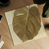 Monstera Leaf I by Wild Apple Portfolio. Shown as a detailed flat fine art print, highlighting archival giclee quality. Available as an archival giclee rolled canvas, fine art paper, or poster print. SKU 37205a.