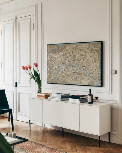 Monuments of Paris Map Blue by Wild Apple Portfolio. shown as a framed stretched canvas in a living room above a console. Available as a archival giclee rolled canvas, fine art paper, or poster print. SKU 10976i.