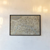 Monuments of Paris Map Blue by Wild Apple Portfolio. shown as a paper print in a black flame. Available as a archival giclee rolled canvas, fine art paper, or poster print. SKU 10976i.