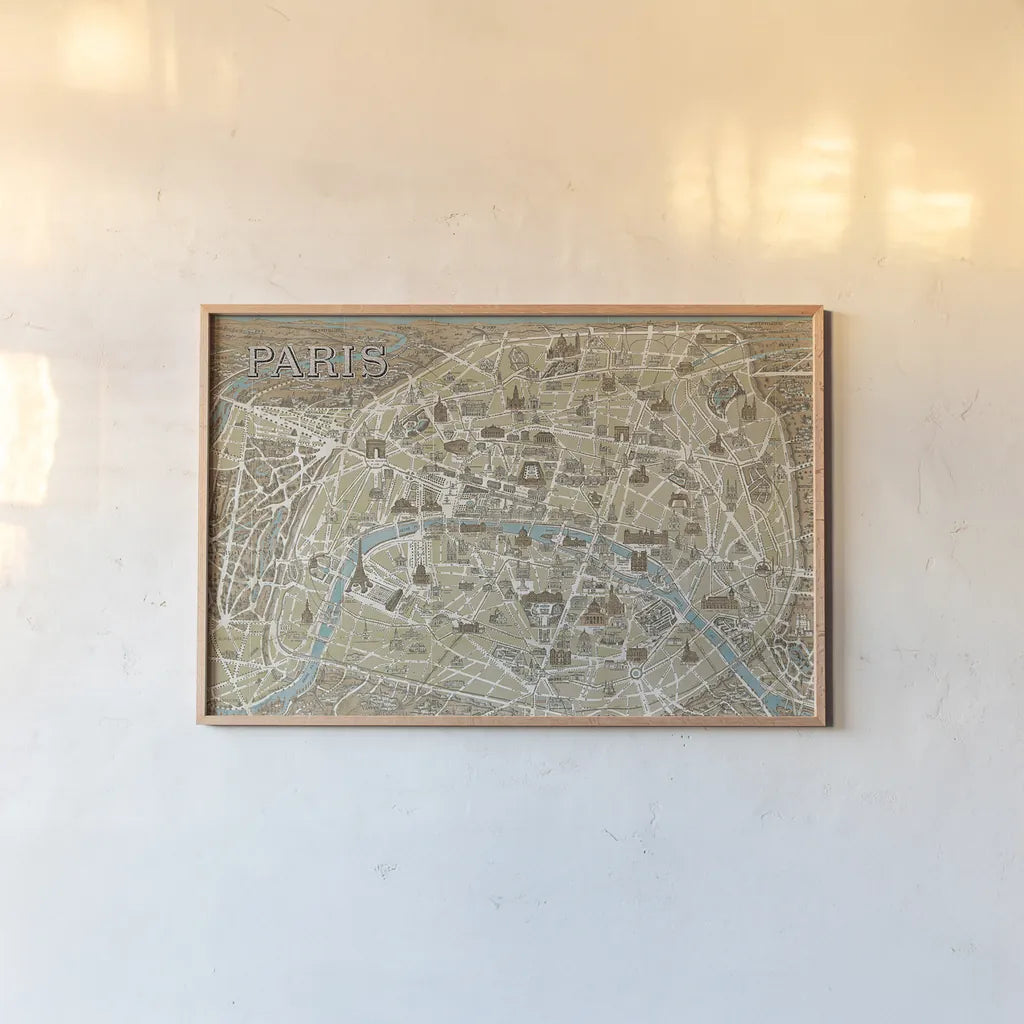 Monuments of Paris Map Blue by Wild Apple Portfolio. shown as a paper print in a natural frame. Available as a archival giclee rolled canvas, fine art paper, or poster print. SKU 10976i.