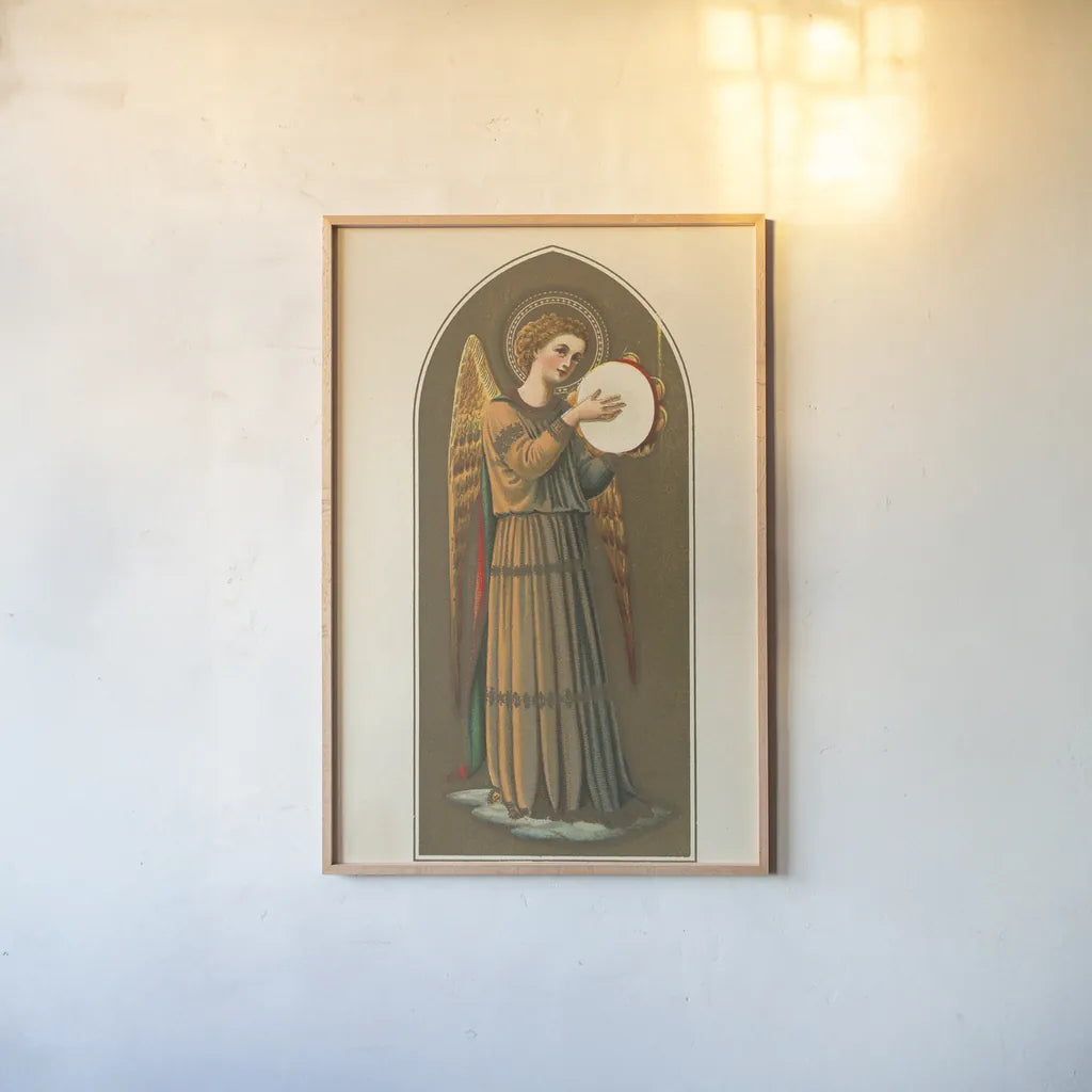 Musical Angel I by Wild Apple Portfolio. shown as a paper print in a natural frame. Available as a archival giclee rolled canvas, fine art paper, or poster print. SKU 92487h.