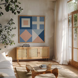 Nautical Flags I by Wild Apple Portfolio. Shown in a natural wood frame in a cozy modern living room. Available as an archival giclee rolled canvas, fine art paper, or poster print. SKU 87318a.