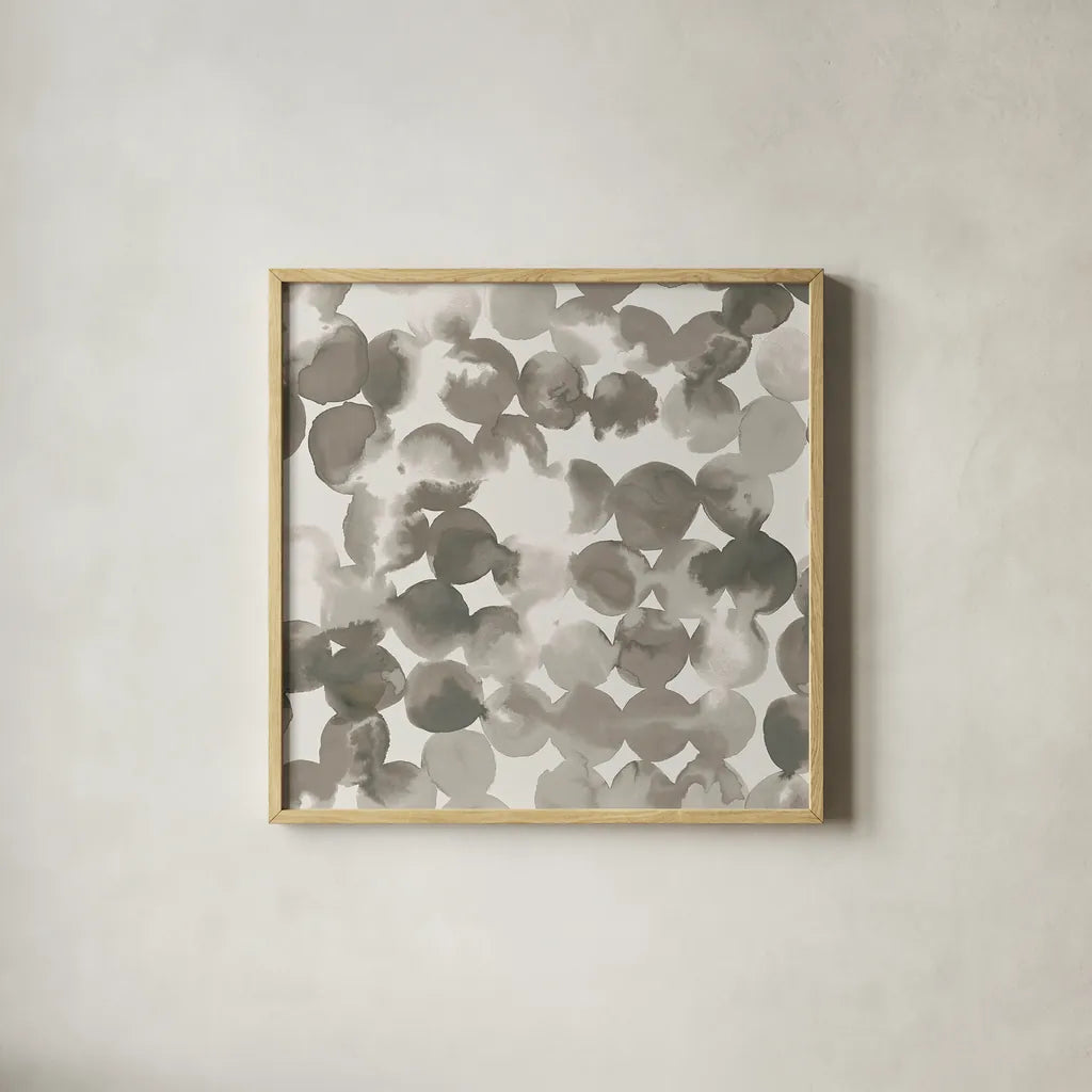 Neutral Circles by Wild Apple Portfolio. Shown in a natural wood glass frame for a timeless modern aesthetic. Available as an archival giclee rolled canvas, fine art paper, or poster print. SKU 21183a.