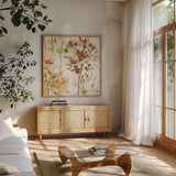 Neutral Medley V by Wild Apple Portfolio. Shown in a natural wood frame in a cozy modern living room. Available as an archival giclee rolled canvas, fine art paper, or poster print. SKU 30739a.