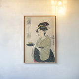 Okita of the Tea House by Wild Apple Portfolio. shown as a paper print in a natural frame. Available as a archival giclee rolled canvas, fine art paper, or poster print. SKU 104938h.