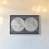 Old World Globe by Wild Apple Portfolio. shown as a paper print in a white frame. Available as a archival giclee rolled canvas, fine art paper, or poster print. SKU 39698i.