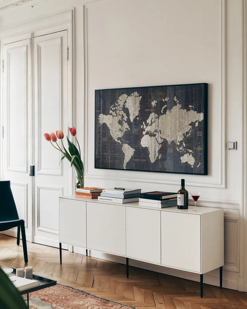 Old World Map Blue by Wild Apple Portfolio. shown as a framed stretched canvas in a living room above a console. Available as a archival giclee rolled canvas, fine art paper, or poster print. SKU 13558i.