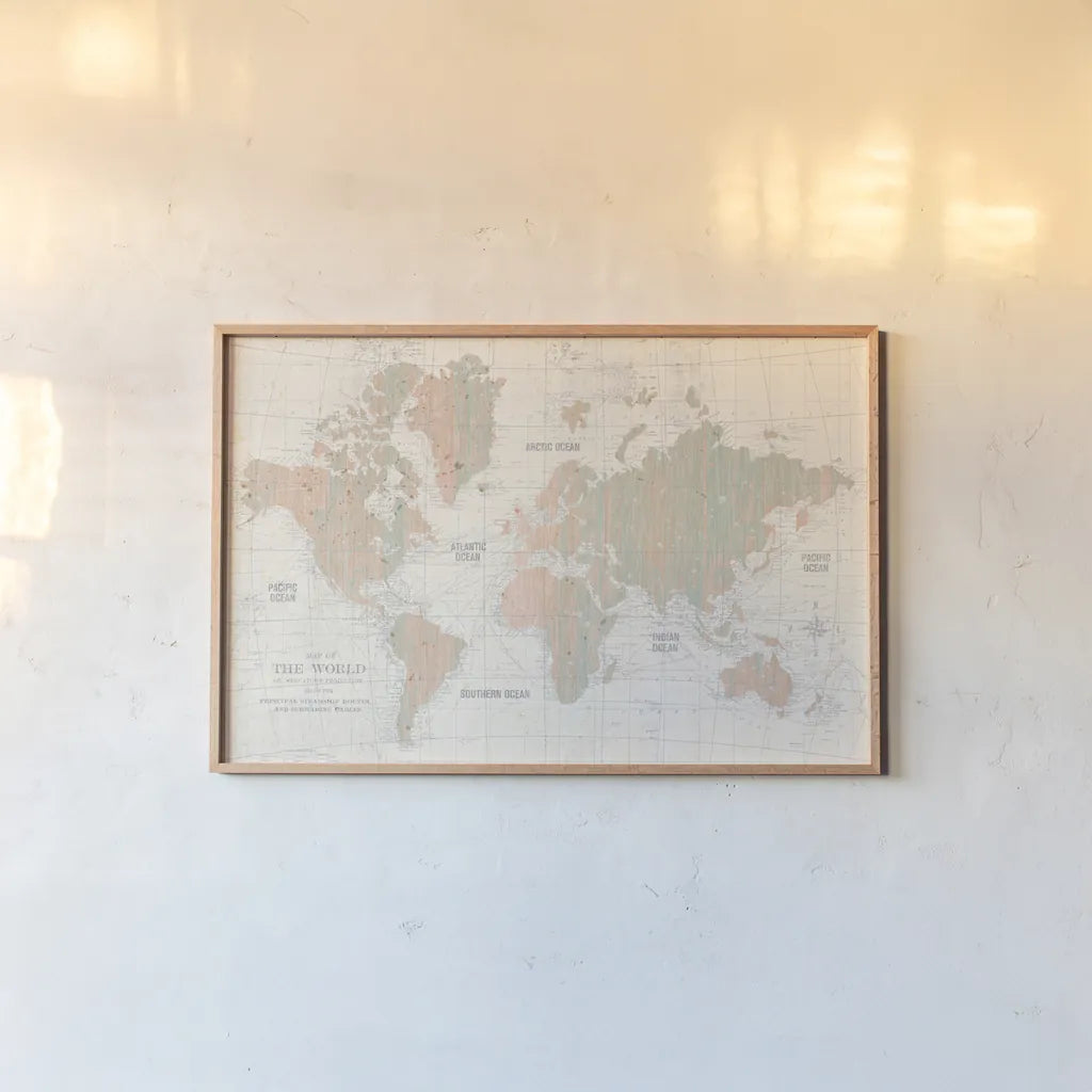 Old World Map Blush and Mint by Wild Apple Portfolio. shown as a paper print in a natural frame. Available as a archival giclee rolled canvas, fine art paper, or poster print. SKU 41810i.