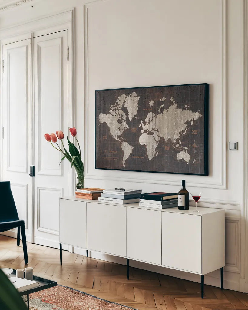 Old World Map Dark Neutral by Wild Apple Portfolio. shown as a framed stretched canvas in a living room above a console. Available as a archival giclee rolled canvas, fine art paper, or poster print. SKU 82961i.