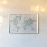 Old World Map Mint Gray by Wild Apple Portfolio. shown as a paper print in a white frame. Available as a archival giclee rolled canvas, fine art paper, or poster print. SKU 41813i.