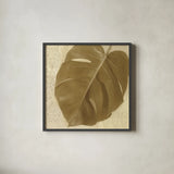 Ornate Monstera Leaf I by Wild Apple Portfolio. Shown in a sleek black glass frame for a contemporary gallery look. Available as an archival giclee rolled canvas, fine art paper, or poster print. SKU 37203a.