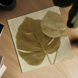 Ornate Monstera Leaf II by Wild Apple Portfolio. Shown as a detailed flat fine art print, highlighting archival giclee quality. Available as an archival giclee rolled canvas, fine art paper, or poster print. SKU 37202a.