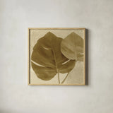 Ornate Monstera Leaf II by Wild Apple Portfolio. Shown in a natural wood glass frame for a timeless modern aesthetic. Available as an archival giclee rolled canvas, fine art paper, or poster print. SKU 37202a.