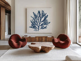 Pacific Sea Mosses Blue on White I by Wild Apple Portfolio. Shown as extra-large giant wall art in a modern living room. Available as an archival giclee rolled canvas, fine art paper, or poster print. SKU 53891a.