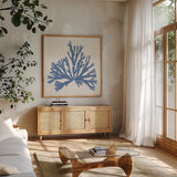 Pacific Sea Mosses IV Light Blue by Wild Apple Portfolio. Shown in a natural wood frame in a cozy modern living room. Available as an archival giclee rolled canvas, fine art paper, or poster print. SKU 55915a.