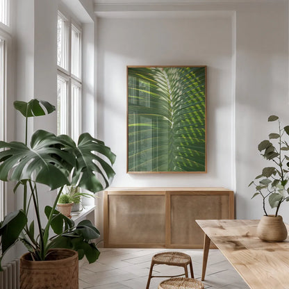 Palm Detail I by Wild Apple Portfolio. shown as a print in a natural wood frame in a dining room. Available as a archival giclee rolled canvas, fine art paper, or poster print. SKU 56300h.
