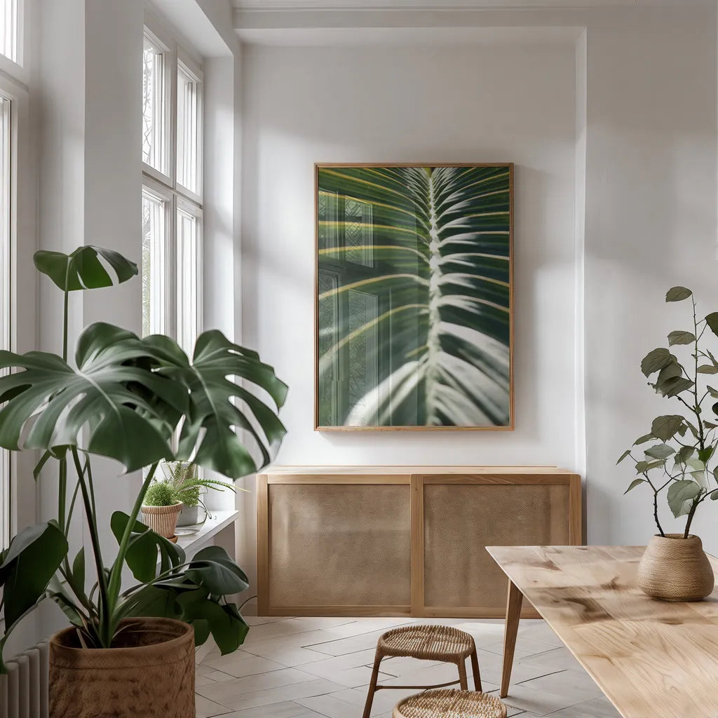 Palm Detail II by Wild Apple Portfolio. shown as a print in a natural wood frame in a dining room. Available as a archival giclee rolled canvas, fine art paper, or poster print. SKU 56301h.
