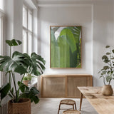 Palm Detail IV by Wild Apple Portfolio. shown as a print in a natural wood frame in a dining room. Available as a archival giclee rolled canvas, fine art paper, or poster print. SKU 56303h.