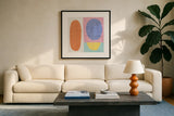 Pastel I by Wild Apple Portfolio. Displayed in a glass frame with matte in a clean modern living room. Available as an archival giclee rolled canvas, fine art paper, or poster print. SKU 84104a.