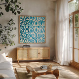 Patterns of Morocco Tile IV by Wild Apple Portfolio. Shown in a natural wood frame in a cozy modern living room. Available as an archival giclee rolled canvas, fine art paper, or poster print. SKU 74303a.