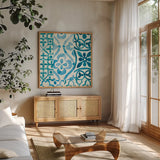 Patterns of Morocco Tile VI by Wild Apple Portfolio. Shown in a natural wood frame in a cozy modern living room. Available as an archival giclee rolled canvas, fine art paper, or poster print. SKU 74309a.