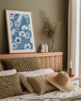 Pen and Ink Flowers on Blue by Wild Apple Portfolio. shown as a paper print in a natural frame. Available as a archival giclee rolled canvas, fine art paper, or poster print. SKU 37151h.