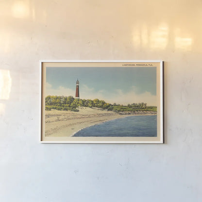 Pensacola Lighthouse by Wild Apple Portfolio. shown as a paper print in a white frame. Available as a archival giclee rolled canvas, fine art paper, or poster print. SKU 75651i.