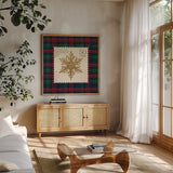 Plaid Christmas Stamp II by Wild Apple Portfolio. Shown in a natural wood frame in a cozy modern living room. Available as an archival giclee rolled canvas, fine art paper, or poster print. SKU 102667a.