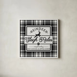 Plaid Holidays III by Wild Apple Portfolio. Shown in a crisp white glass frame for a clean and minimalist style. Available as an archival giclee rolled canvas, fine art paper, or poster print. SKU 62151a.