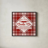 Plaid Holidays IV Red by Wild Apple Portfolio. Shown in a sleek black glass frame for a contemporary gallery look. Available as an archival giclee rolled canvas, fine art paper, or poster print. SKU 64771a.