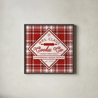 Plaid Holidays IV Red by Wild Apple Portfolio. Shown in a sleek black glass frame for a contemporary gallery look. Available as an archival giclee rolled canvas, fine art paper, or poster print. SKU 64771a.