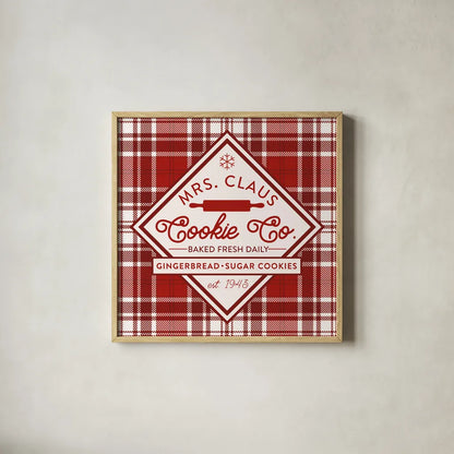 Plaid Holidays IV Red by Wild Apple Portfolio. Shown in a natural wood glass frame for a timeless modern aesthetic. Available as an archival giclee rolled canvas, fine art paper, or poster print. SKU 64771a.