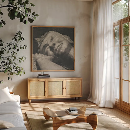 Reclining Buddha by Wild Apple Portfolio. Shown in a natural wood frame in a cozy modern living room. Available as an archival giclee rolled canvas, fine art paper, or poster print. SKU 38801a.