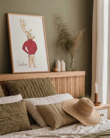 Reindeer I by Wild Apple Portfolio. shown as a paper print in a natural frame. Available as a archival giclee rolled canvas, fine art paper, or poster print. SKU 103515h.