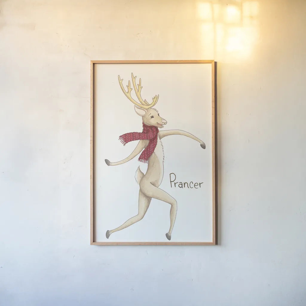 Reindeer III by Wild Apple Portfolio. shown as a paper print in a natural frame. Available as a archival giclee rolled canvas, fine art paper, or poster print. SKU 103517h.