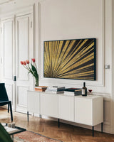 Rising Sun by Wild Apple Portfolio. shown as a framed stretched canvas in a living room above a console. Available as a archival giclee rolled canvas, fine art paper, or poster print. SKU 62017i.