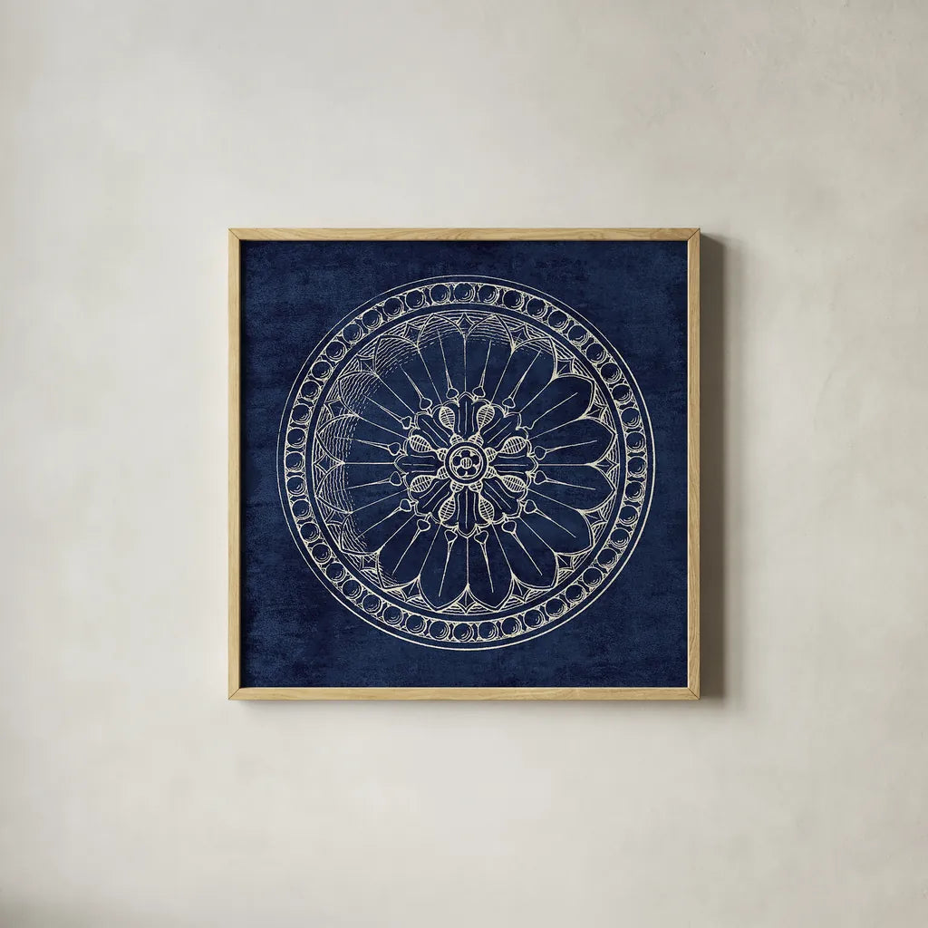 Rosette I Indigo by Wild Apple Portfolio. Shown in a natural wood glass frame for a timeless modern aesthetic. Available as an archival giclee rolled canvas, fine art paper, or poster print. SKU 23696a.
