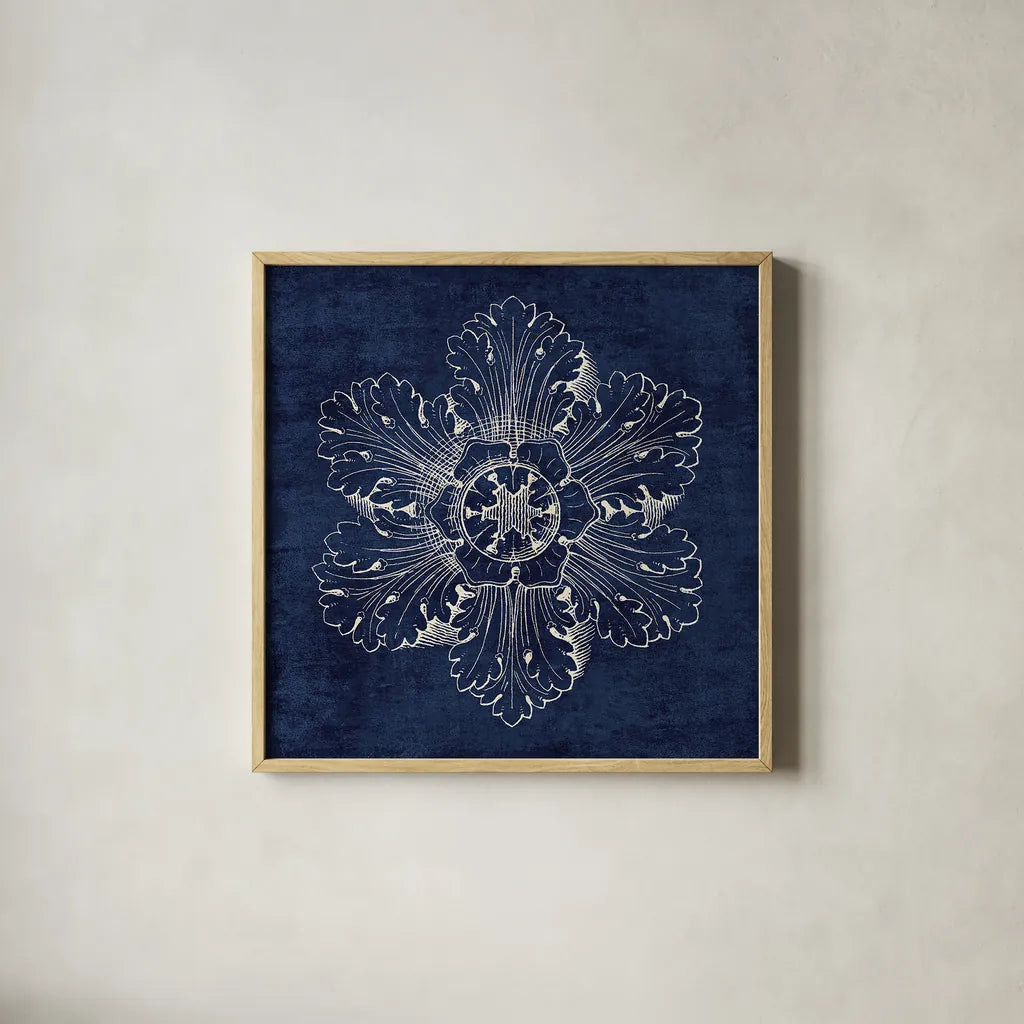 Rosette V Indigo by Wild Apple Portfolio. Shown in a natural wood glass frame for a timeless modern aesthetic. Available as an archival giclee rolled canvas, fine art paper, or poster print. SKU 23700a.